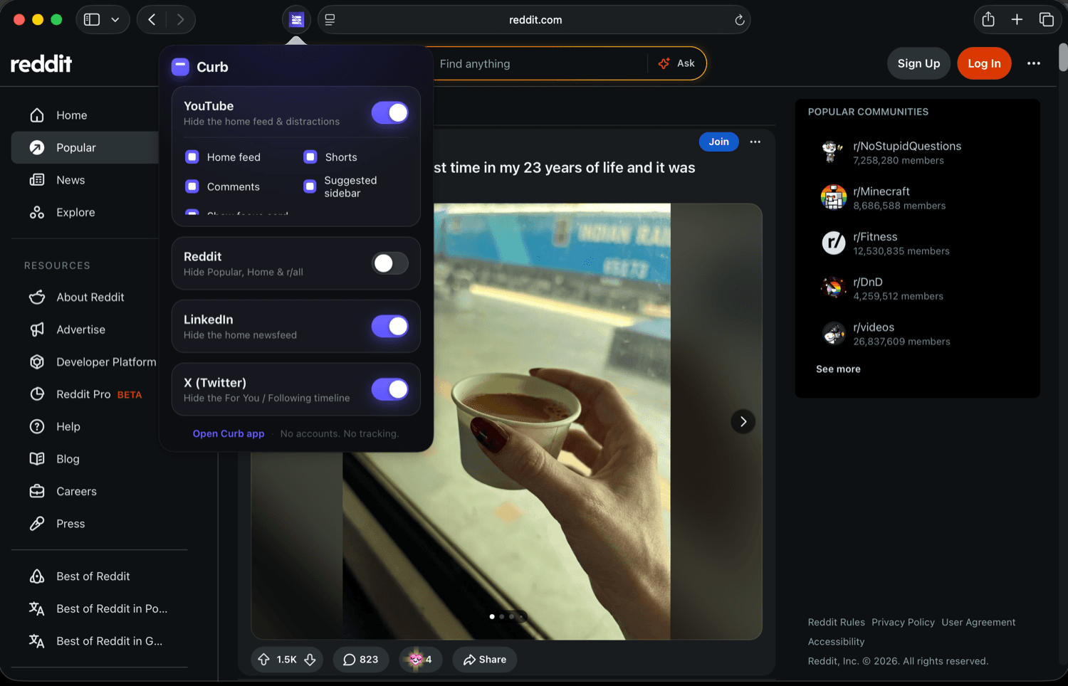 Reddit home feed visible with Curb off